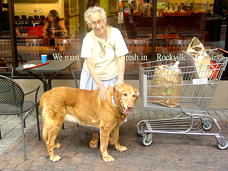 Wiley stops to greet this Giant Food shopper.