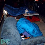 Chairs and sleeping bags are left behind as fans get ready to watch the premier.