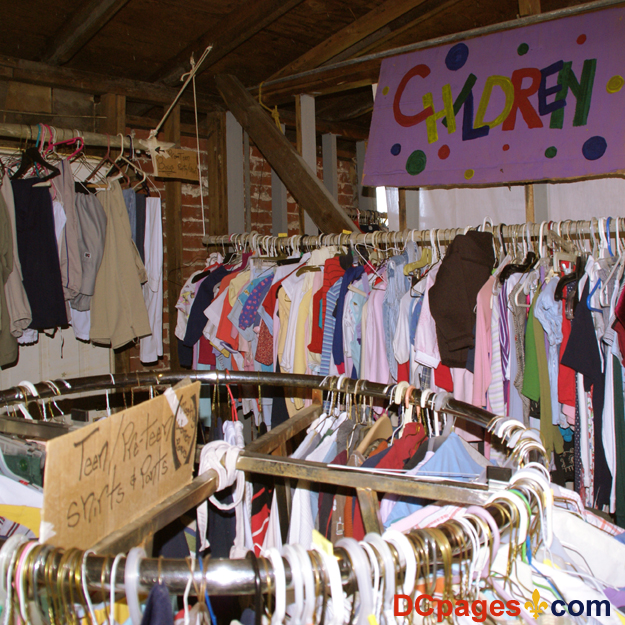 August 2, 2007 - Ninth Ward of New Orleans - Common Ground Relief  - Distribution Center - Racks filled with donated clothing.
