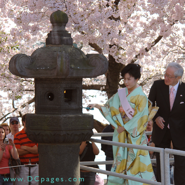 Kurumi Furusawa represents the Embassy of Japan. The lantern commemorates the 100th anniversary of Commodore Matthew Perry's historic mission to Japan.
