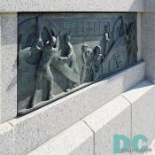 Bas relief sculpture along the World War II ceremonial entrance.