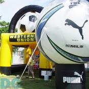Huge soccer ball with Puma logo was the symbol of Western Union's Free Kick game. 