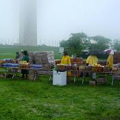 Volunteers wait with food and refreshments for the runners to finish
