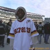 This man has the famous numbers on his Redskins Jersey. 28, 17, 81, and 33. 