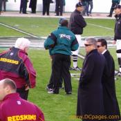 Dan 'the Money Man' Snyder walks on Eagles field dressed in black. "Hey, Where is your Burgandy and Gold?"