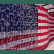 The flag transforms to images of americans decended from every ethnic background. The exhibit was designed by MetaForm Inc.