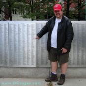 Luke Wilbur points to his grandparents from Spain. More than 600,000 names are marked on The American Immigrant Wall of Honor.