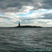A long distance view of Liberty Island in New York Harbor. 