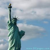On February 18, 1879, Bartholdi was granted a design patent, U.S. Patent D11023, on "a statue representing Liberty enlightening the world, the same consisting, essentially, of the draped female figure, with one arm upraised, bearing a torch, and while the other holds an inscribed tablet, and having upon the head a diadem, substantially as set forth.