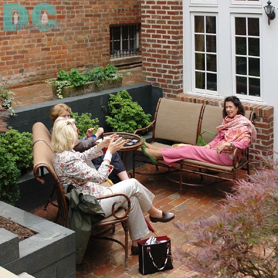 People relaxing in the patio.