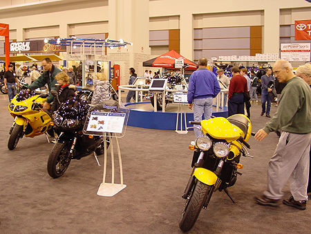 The yellow bike on the right is Triumph's Speed Four 4 cylinder naked sport bike.