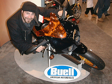 Wow, this guy is good on that brand new Buell Firebolt XB9R. Whats interesting about this bike is that it's aluminum frame holds fuel, a gigantic single disc brake rotor, a belt-drive instead of chain, and it's american. 
