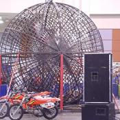 The one of a kind performance features three motorcycle riders hitting some serious G-forces as they synchronize their motorcycles to perform insane stunts in a giant 16-ft steel globe.