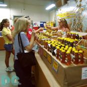 Many different types of honey were for sale.