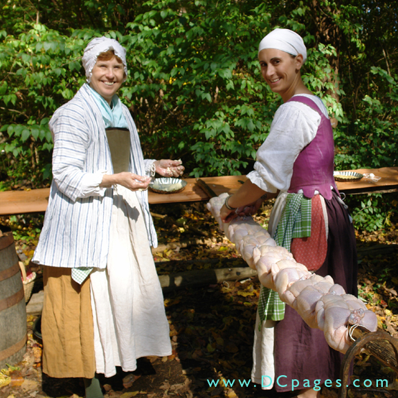 These two women really appreciate the amount of work it took to make a meal in the 18th century.