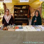 The stationers booth offers fine writing implements and books.