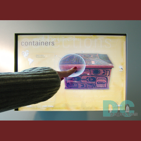 A touch screen magnifies and gives information on one ot the museum's artifacts.