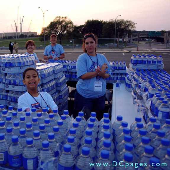 Volunteers lay out ice cold water for the thirsty "Freedom Walkers." The support and compassion of these people make the healing process a little easier for the families and friends of the victims of 9/11.