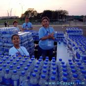 Volunteers lay out ice cold water for the thirsty "Freedom Walkers." The support and compassion of these people make the healing process a little easier for the families and friends of the victims of 9/11.
