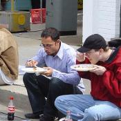 People relaxed on the otherwise crowded streets of Bethesda to enjoy some food.