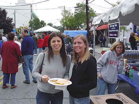 Myriah and Michelle get ready to try their food from Heritage India.