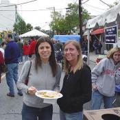 Myriah and Michelle get ready to try their food from Heritage India.