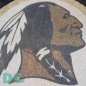 Handcrafted tile work of the Washington Redskins emblem.