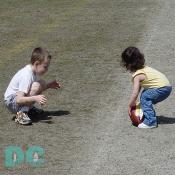 Two kids practice for Redskins mini camp.