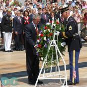 President George W. Bush places the wreath in front of the Tomb of the Unknowns.