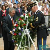 President George W. Bush lays a wreath at the Tomb of the Unknowns during Memorial Day ceremonies at Arlington National Cemetery on May 29, 2006.