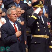President George W. Bush stands with U.S. Army Major General Guy Swan in front of Tomb of the Unknowns in Arlington, Va., Monday, May 29, 2006. 