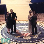 President George Bush and first lady Laura Bush participate in an Inaguaral dance with Army Spc. Jazmin Azcona and Marine Lance Cpl. Richard Devon Hansen during the Commander In Chief Presidential Ball in Washington, D.C.