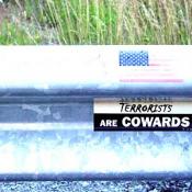 Terrorists are cowards bumper sticker.