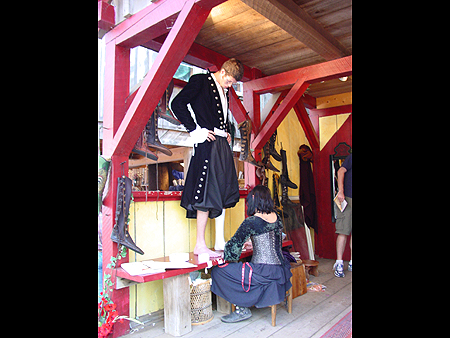 Catskill Mountian boot shop. This lady is fitting him for a pair of handmade boots.