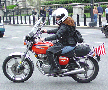 A female rider showing her support for the war vets.