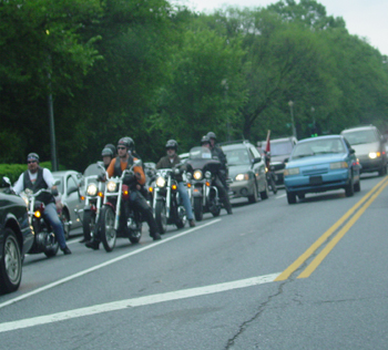 Another group of riders just entering the city.