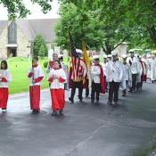 Knights of Columbus lead a procession at the 'Gates of Heaven' cemetary