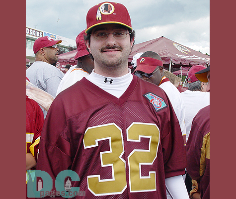 Ali Alugaily, 27, of Vienna, Virginia sports retro Ricky Ervins jersey.  Alugaily said he wanted to wear "something unusual." The Redskins wore these jerseys during the NFL's 75th annivarsary season.