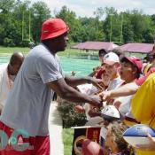 LaVar Arrington takes time to shake hands with the fans.