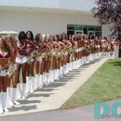 The Redskins Cheerleaders make their way to the practice field to perform.
