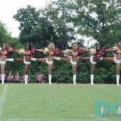 Adorned in burgundy and gold, flanking the field on every side and executing routines that would make even the fastest football player gasp for air, these ladies strive for one thing -- to make a difference. 