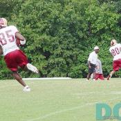 WR's Darnerien McCants and Laveranues Coles both catch passes during drills