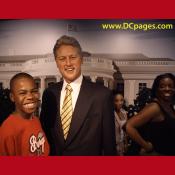 DC Resident, Andre, and a model President Bill "Slick Willie" Clinton give a big smile for the camera.