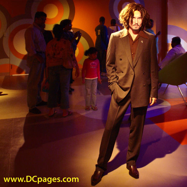 Chic celebrity party - Johnny Depp and his long layered hair style.
