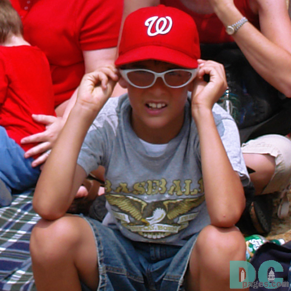 That young Washington Nationals fan sure has some cool sunglasses.