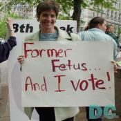 A Pro Life joke. A smiling woman exclaims Former Fetus and I vote.