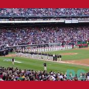 Washington Nationals' Inaugural Home Opener - First Base Stand view of players from the Washington Nationals and the Arizona Diamondbacks line up along the baselines to sing the National Anthem.
