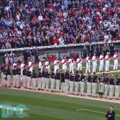 Washington Nationals' Inaugural Home Opener - Dougout view view of players from the Washington Nationals and the Arizona Diamondbacks line up along the baselines to sing the National Anthem.
 