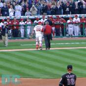Washington Nationals' Inaugural Home Opener - President Bush shakes hands with Nationals catcher Brian Schneider after throwing out the first pitch.