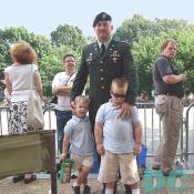 Lieutenant Colonel Bill Solmes with his two sons waiting to pay respects President Reagan.